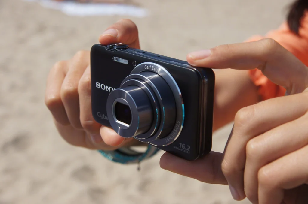 Compact Camera in Hand